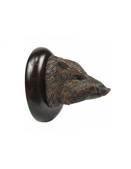 Bronce de cabeza de cochino del autor Lucio Relaño