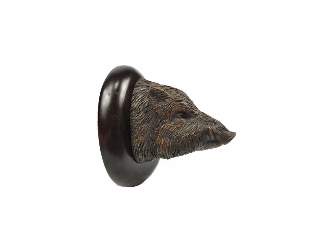 Bronce de cabeza de cochino del autor Lucio Relaño