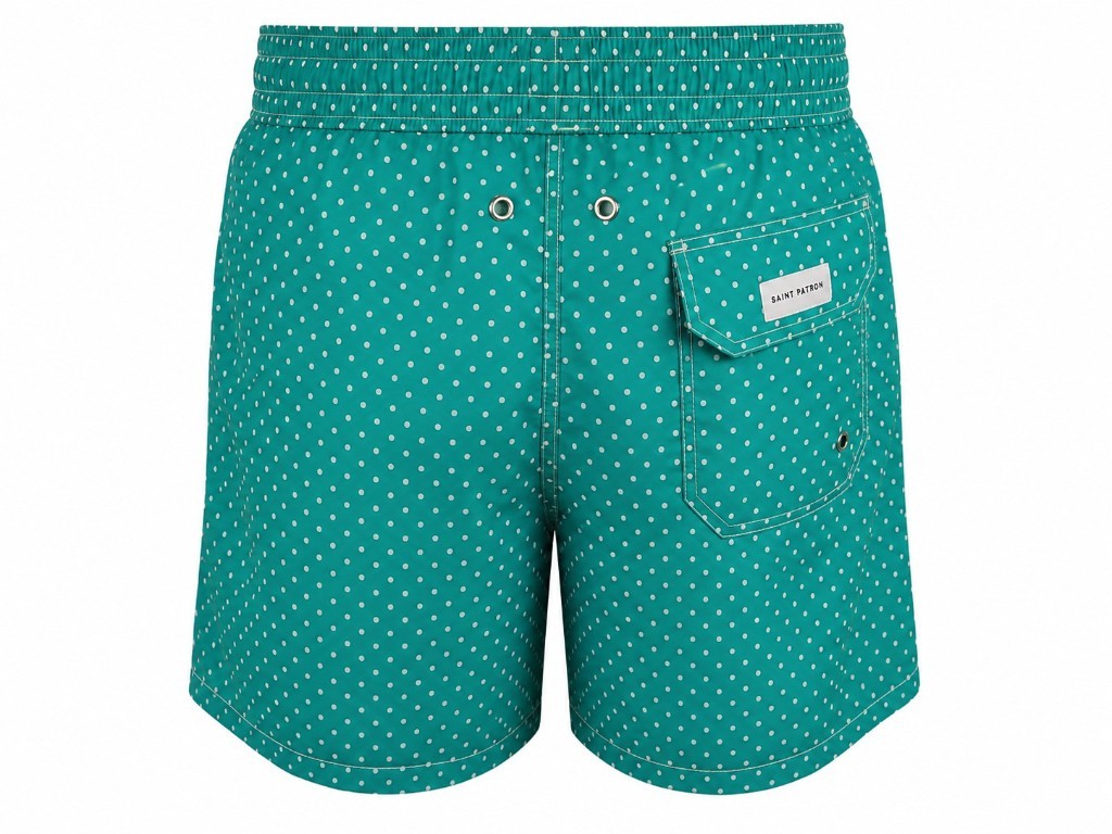Traje de baño verde con lunares blancos