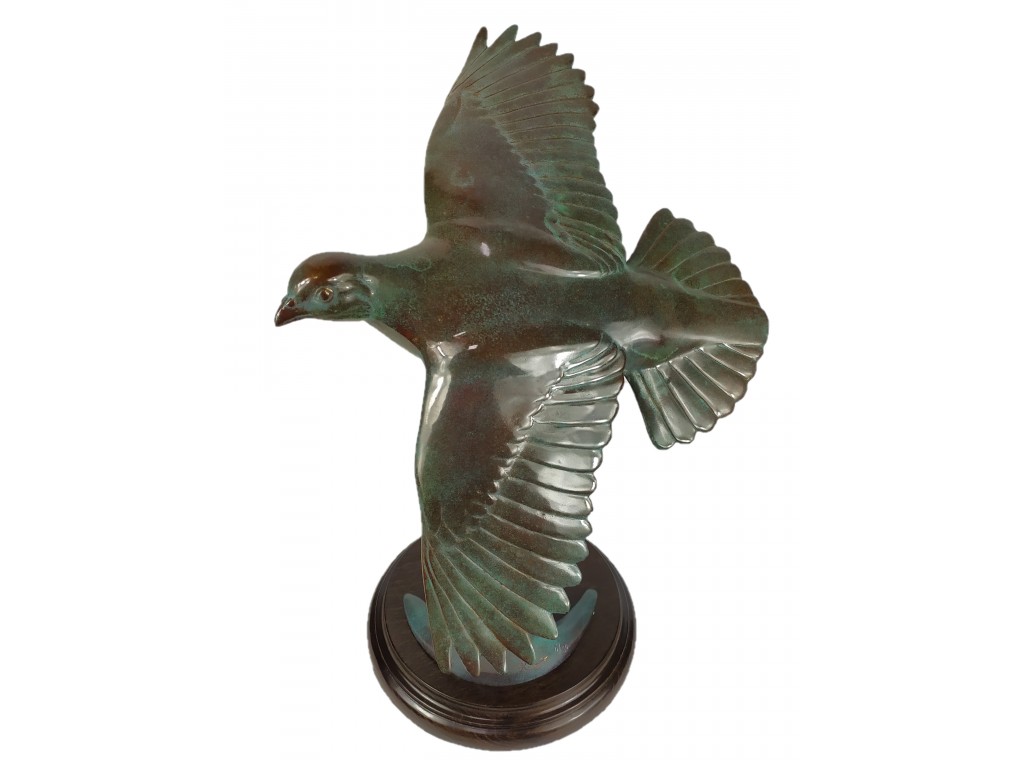 Bronce pulido verde perdiz volando de Lucio Relaño