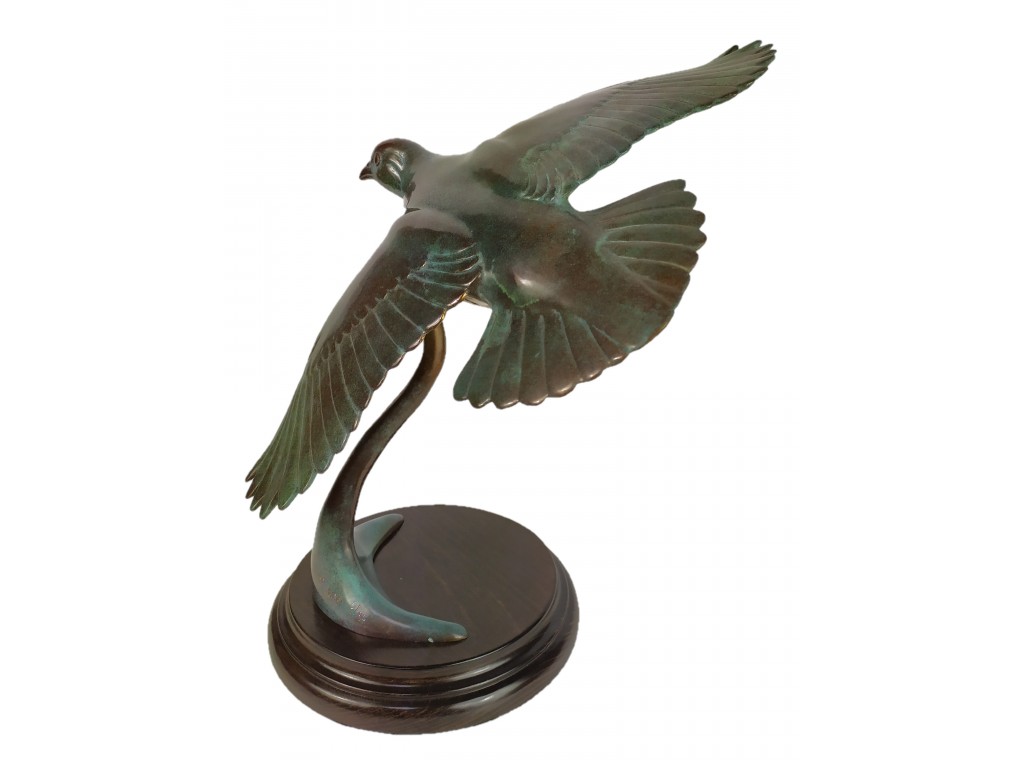 Bronce pulido verde perdiz volando de Lucio Relaño