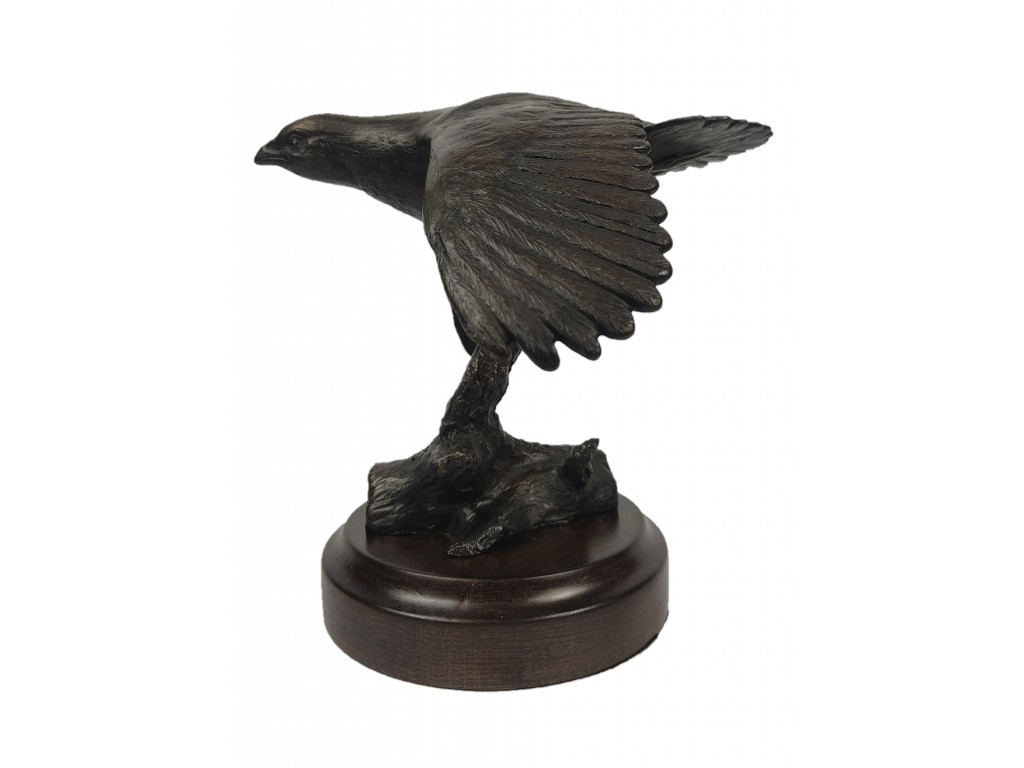 Bronce perdiz volando de Lucio Relaño