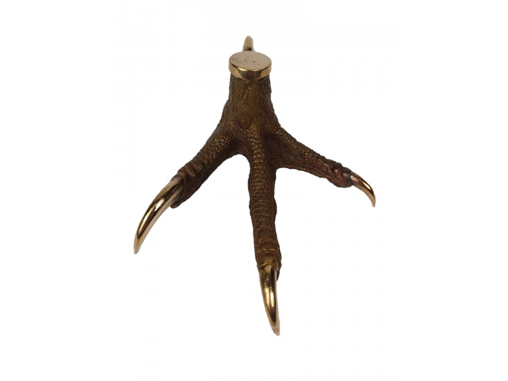 Bronce de garra del artista Lucio Relaño.