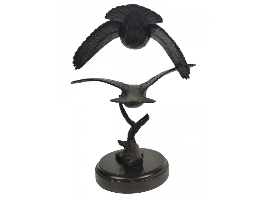 Bronce de pareja perdices volando del autor Lucio Relaño