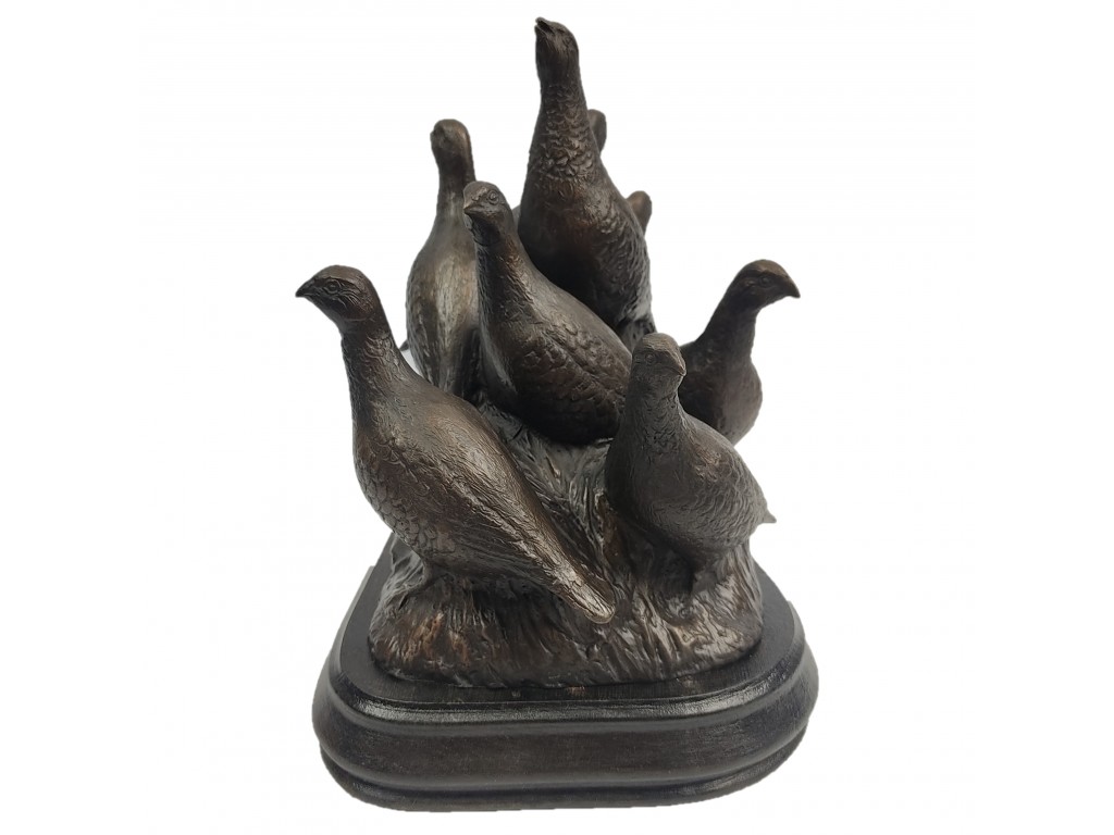 Bronce de grupo de 8 perdices del autor Lucio Relaño