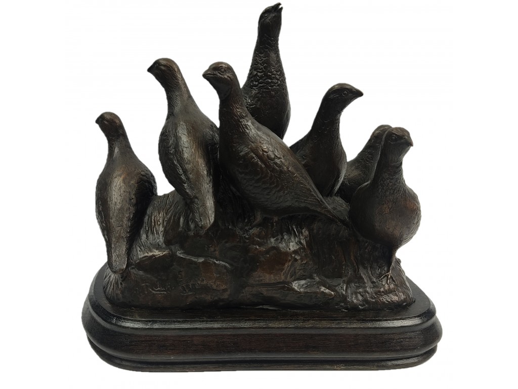 Bronce de grupo de 8 perdices del autor Lucio Relaño