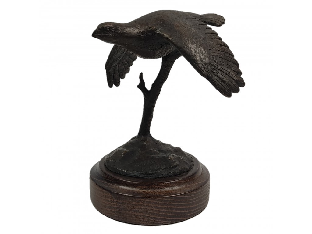 Bronce pequeño de perdiz volando del autor Lucio Relaño