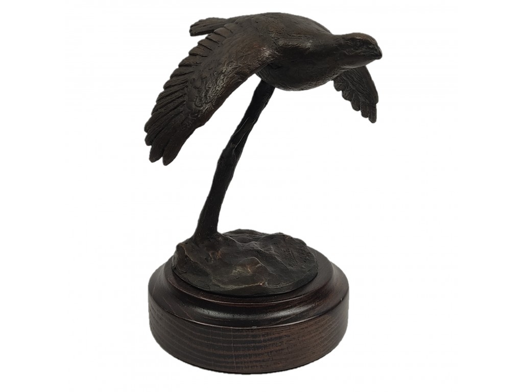 Bronce pequeño de perdiz volando del autor Lucio Relaño
